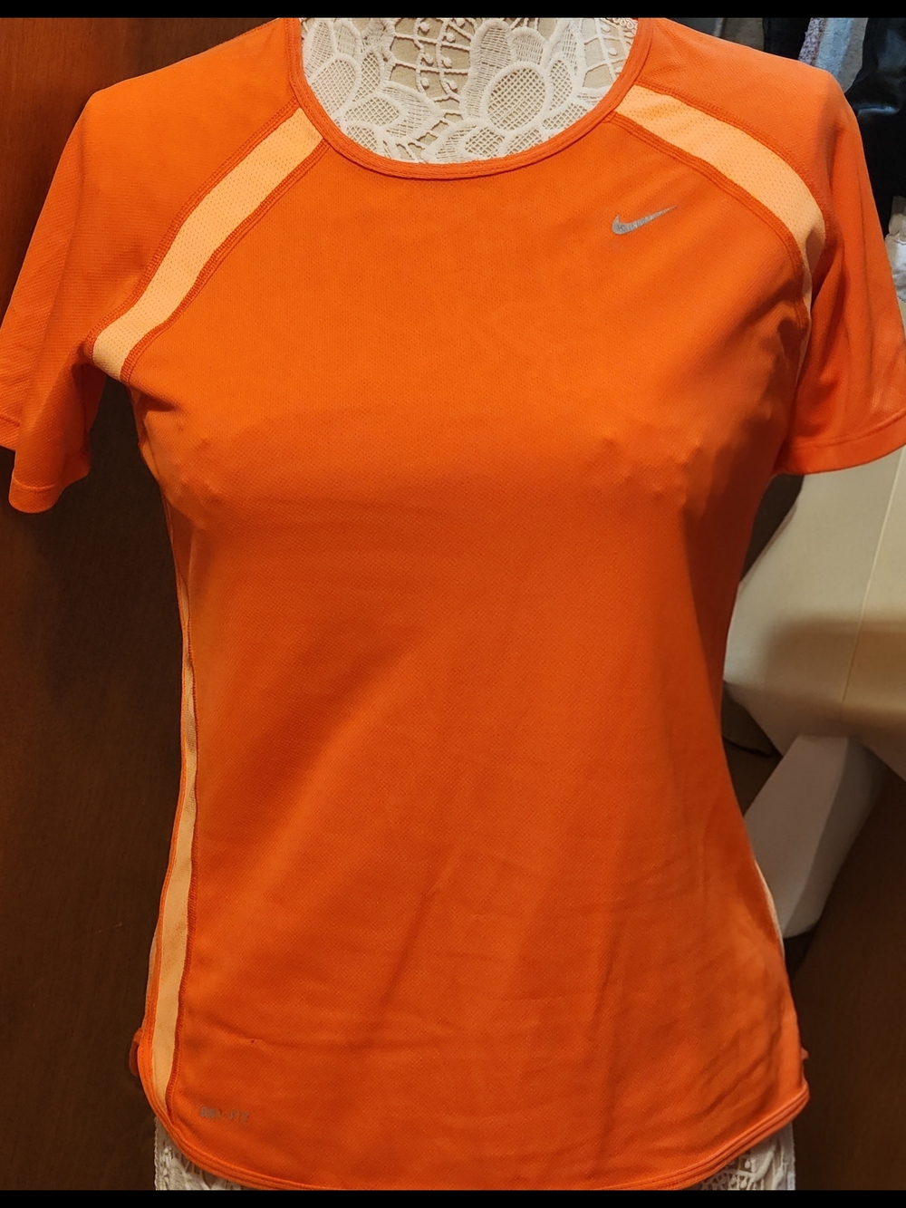 Nike Women’s Orange Short Sleeve Performance Tee with Light Peach Accents